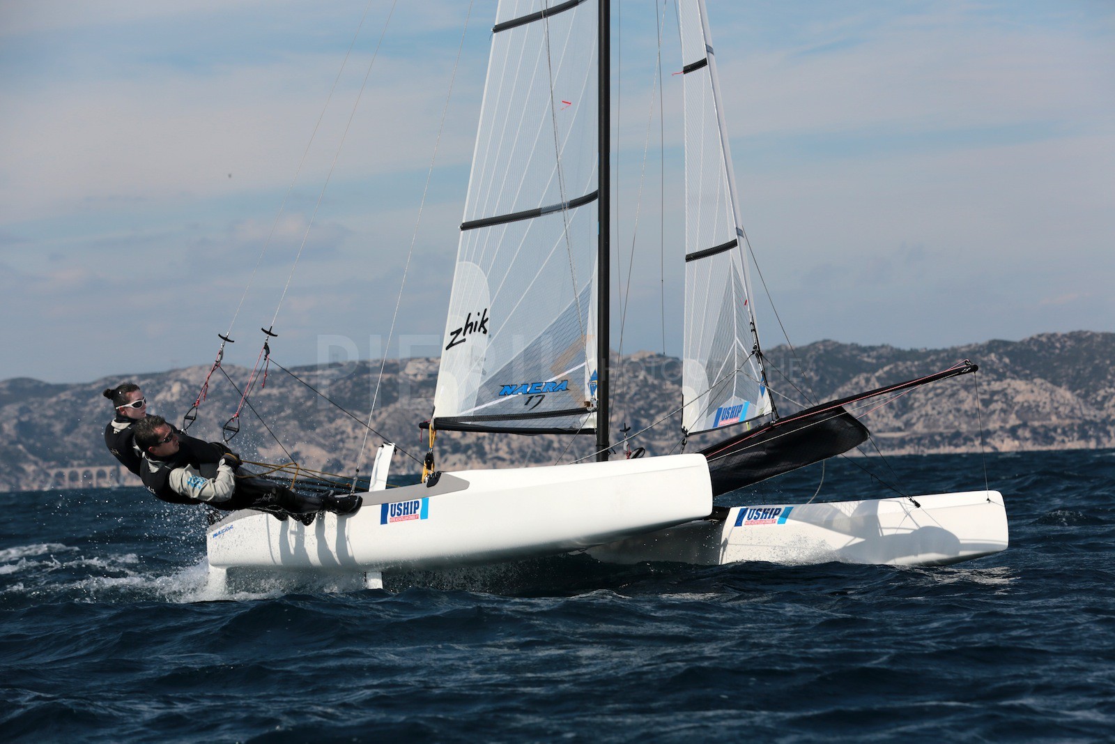 Ingrid Petitjean et Olivier Backes lors du baptême de leur Nacra 17 à la SNM. En route pour les JO de Rio