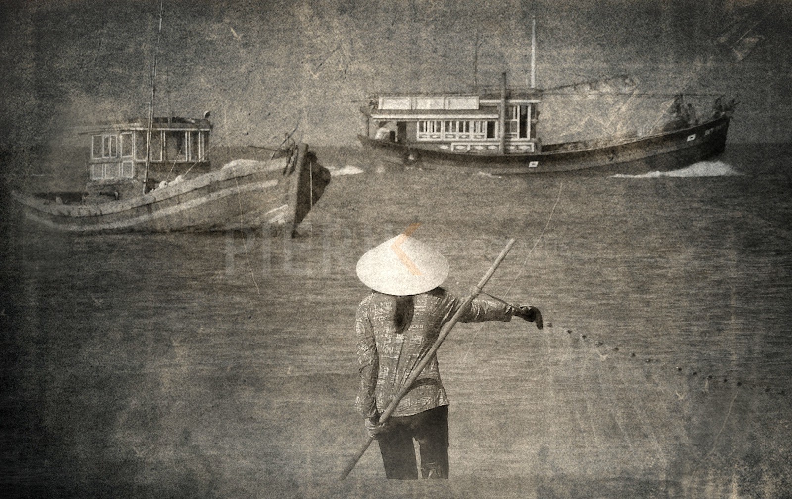 Pêcheurs sur la plage de Mui Ne